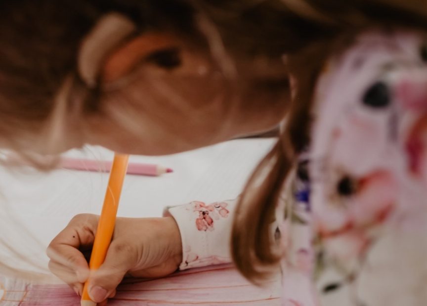 girl decorating DIY calendar