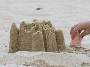 Sand Tray Ideas for Toddlers knock down sand towers 1